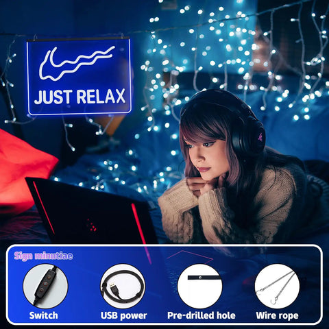 Laser Dotted Neon Sign For Home Decor USB Powered With Dimmer Switch showing 'Just Relax' in blue with a person using a laptop.