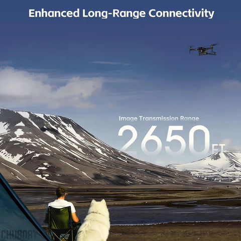 4K Camera Drone With Long Range Up To 2650 Ft Foldable Beast Quadcopter flying over mountains showcasing range capability.