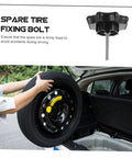 Spare Tire Bolt For Easy Safety Mounting And Strong Hold Down Hardware Fits Multiple Car Models Quick Install No Tools Needed Durable High Strength Retaining Screw For Reliable Vehicle Security, shown with a person mounting a spare tire in a car trunk.