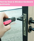 Person using screwdriver from Pink Tool Set For Women With 50-Piece All-In-One Hand Tool Kit for door hardware adjustments