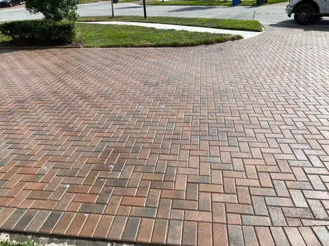 Straight Up Hella Durable Crystal Clear Paver Sealer And Concrete Masonry Guard Water Based Acrylic Coating That Locks Out Grime And Keeps Patios Looking Fresh In A Five Gallon Size on a paver driveway.