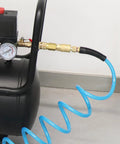 Reinforced Polyurethane Recoil Air Hose Ten Feet With Bend Restrictor And Quarter Inch Quick Coupler And Plug connected to compressor.