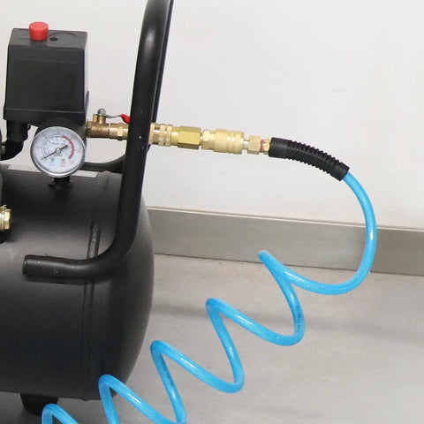 Reinforced Polyurethane Recoil Air Hose Ten Feet With Bend Restrictor And Quarter Inch Quick Coupler And Plug connected to compressor.