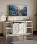 Slick Farmhouse TV Stand For 65 Inch Flat Screen Television Featuring Smooth Sliding Barn Doors And Creamy Milk White Finish in living room.