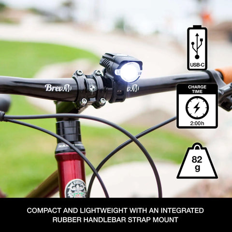 Swift 700 Lumen USB C Rechargeable Front Bike Light mounted on handlebar, showing its compact design and lightweight features.