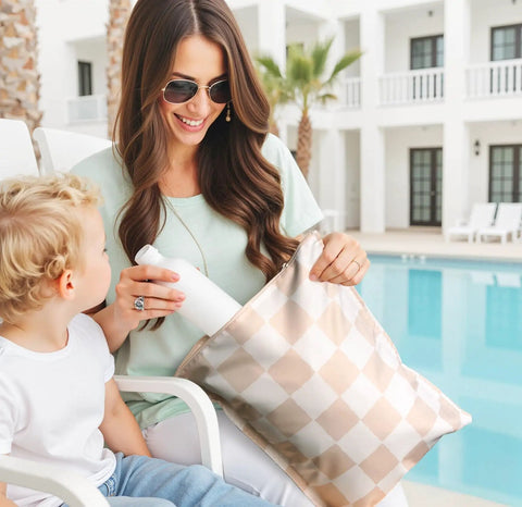 Mother and child by pool with Waterproof Wet Dry Bags Set Of 2 For Swimwear And Baby Clothes Leakproof Reusable Pouches