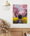Vintage Steam Train Tin Plaque Sign 12X16 Inch With Cherry Blossom Tunnel And Yellow Wildflowers on a living room wall.