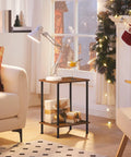 Industrial Style End Table for Small Spaces, Rustic Brown Two-Tier Side Table with Stable Frame, Nightstand or Sofa Table, Easy Assembly, Space-Saving Storage for Living Room or Bedroom shown beside a sofa with gifts and holiday decor