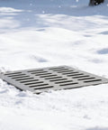 Catch Basin With Stainless Steel Grate And Debris Basket Large 18x18x15 Inch Drainage Basin Installed in Snowy Yard