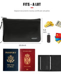 Extreme Heat Fireproof Money And Document Bag 2000F, Black zippered pouch next to passports, cards, cash, and USB.