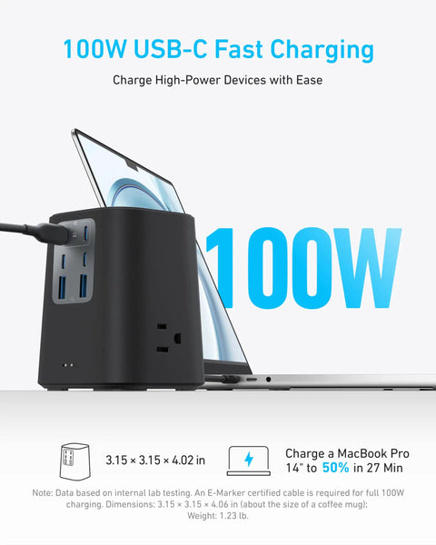 Black nine-in-one desktop power strip with USB-C ports charging a laptop, labeled 100W, highlighting fast charging capabilities.