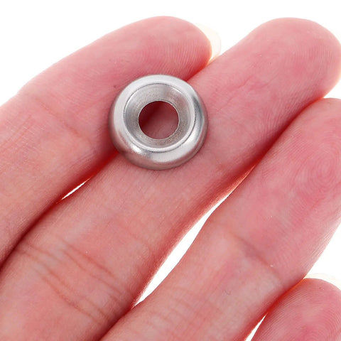 Stainless Steel Flat Countersunk Washer Kit 100 Piece Set For Deck Screws And Equipment DIY Friendly Built To Last Reduces Deformation Great For Furniture Hardware And Wood Projects Silver Finish, close-up in hand