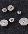 Pro Grade Six Piece Stainless Steel Wood Dowel Center Kit With Pins For Precise Furniture Positioning And Smooth Drilling Alignment And Quick Installation Includes 4mm 5mm 6mm 8mm 10mm And 12mm Dowel Centers. Six stainless steel dowel centers on black background