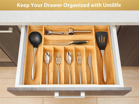 Straight Up Expandable Bamboo Kitchen Drawer Organizer With 2.5 Inch Elevated Sides And Curved Grooves showing sorted utensils in a drawer.