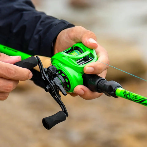 Legit Zephyr Dual Tip Casting Fishing Combo Featuring Ultra Light Im6 Graphite Rod And Left Hand Reel in green color during use.