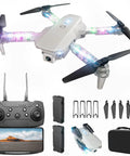 Kids Drone With Camera 1080P HD FPV Quadcopter with remote, batteries, and colorful LED lights displayed with accessories