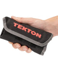 Hand holding Eight Tool Stubby Wrench Roll Organizer For Five Sixteenths To Three Quarters Inch Stubby Wrenches, compact and portable