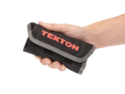 Hand holding Eight Tool Stubby Wrench Roll Organizer For Five Sixteenths To Three Quarters Inch Stubby Wrenches, compact and portable