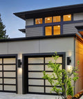 Modern house exterior with 4 Pack Outdoor Wall Lights For Porch And Patio, Waterproof Black Aluminum Sconce Fixtures With Up And Down Lighting