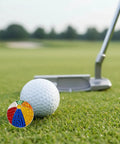Beach Ball Crystal Golf Marker For Putting Green, Premium 1 Inch Ball Marker by a white golf ball and putter on green