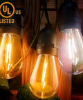Close-up of 52Ft Outdoor String Lights With Warm White And Cool White Color Change Dope Remote Control And 11 Modes Waterproof Shatterproof 30V LED Bulbs For Patio Garden Party Decor