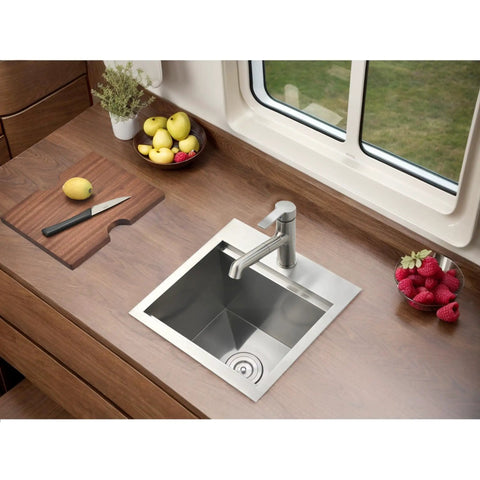 Stainless Steel Bar Sink 15 x 15 Inch Drop In Topmount Workstation Single Bowl Perfect For Kitchen Office Laundry Wet Bar RV Outdoor Yard Prep With Ultra Thick 3mm Rim And 16 Gauge Durability installed in kitchen counter with fruit nearby.