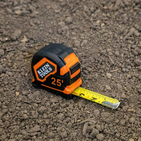 Heavy Duty Pro-Grade 16-Foot Tape Measure With Single Hook Nylon Reinforced Blade And Metal Belt Clip on soil surface