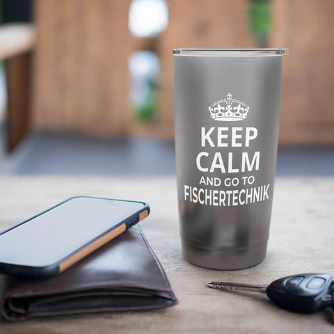 Keep Calm And Go Skiing Stainless Steel Insulated Tumbler 16 oz, gray cup with lid on table