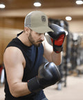 Man boxing wearing Lightweight Low Profile Trucker Hat For Men Apricot Washed Cotton Dad Cap With Adjustable Strap