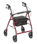 Top Notch Aluminum Folding Rollator Walker With Super Comfy Padded Seat Removable Back Support And Roomy Storage Sling on smooth 7.5 inch wheels.