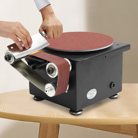 Super Compact 3 In 1 Electric Belt And Disc Sander, Adjustable Speed Bench Grinder sharpening a knife on the disc.