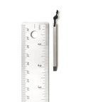 Ultra Lightweight Titanium Keychain Pry Bar With Minimalist Slim Design Everyday Carry Essential next to a ruler for size reference.