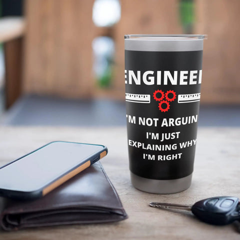 Not Arguing Just Explaining It With Engineering Logic Stainless Steel Insulated Tumbler on desk with wallet and phone.