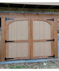 Wooden barn doors fitted with Beefy Heavy Duty T Shape Door Hinges With Screws 2 Inch Black Iron Wrought Hardware for durable support.