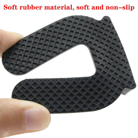 Close-up of non-slip rubber furniture wheel stopper in hand, showing soft material and textured grip, 4 Pack Rubber Furniture Wheel Stopper Set For Chairs And Beds Non Slip Silent Caster Stoppers Protect Floors Easy To Clean Large 7.5 Centimeter Diameter Internal 48x22 Millimeter Fit For Rolling Furniture.