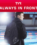 Person by the pool with All In One Wet Dry Gym And Pool Backpack With 45L Capacity, showing side view of ergonomic design.