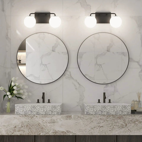 Bathroom with two light mid century vanity lights over mirror, matte black with milk white glass globes, industrial farmhouse style.