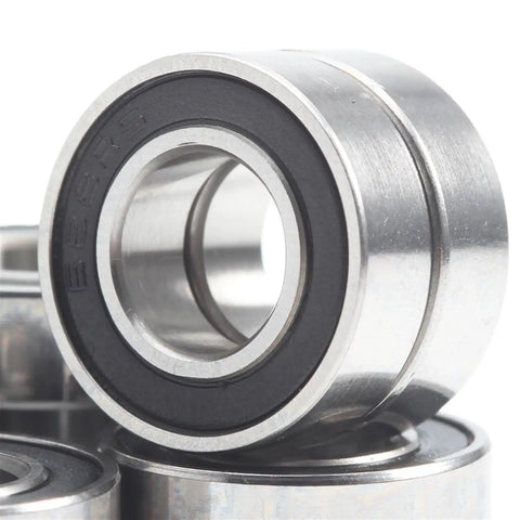 Close-up of Ten Pack 8x16x5 mm ABEC-7 RC Car Bearings With 2RS Sealed Black Finish for Hobby Trucks and Buggies