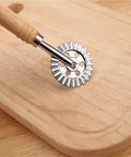Multipurpose Dough Roller And Pastry Wheel Cutter For Pizza Round Blade Pizza Cutter on wooden board