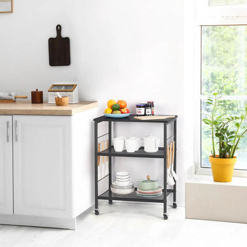 Real Deal Three Tier Rolling Cart With Smooth Ride Wheels For Kitchen Microwave Storage And Flexible Home Organization against a white wall.