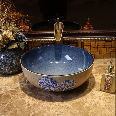 USZWBY Vessel Sinks Bathroom Vessel Sink Art Countertop Basin Utensil Round Ceramic Washbasin with Faucet Bathroom Bowl Sink on countertop.