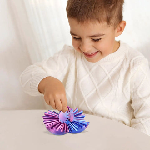 Child playing with 3D Printed Gear Sphere Fidget Toy For Sensory Stress Relief And Chill, a deep purple 2.6-inch desk accessory.