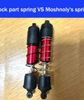 Comparison of ARRMA 1/8 Mojave 4S Spring Steel Shock Absorber Springs 1.8mm Wire vs stock part on wooden surface.