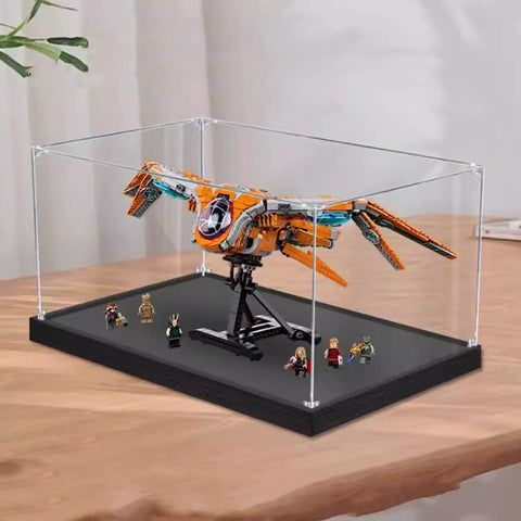 Clear Acrylic Display Case For 76193 Airship Collectible, Dustproof Shield holding model on wooden table
