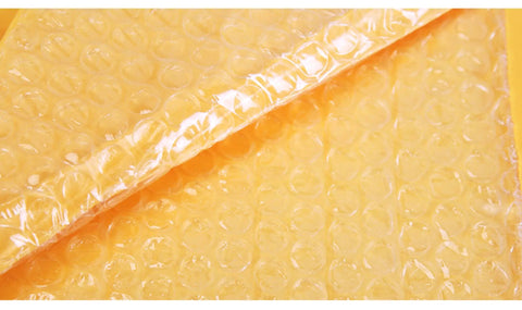 Close-up of gold bubble lining inside Gold Kraft Paper Bubble Mailers 10.5x16 Self Seal Padded Envelopes for easy no fuss shipping.