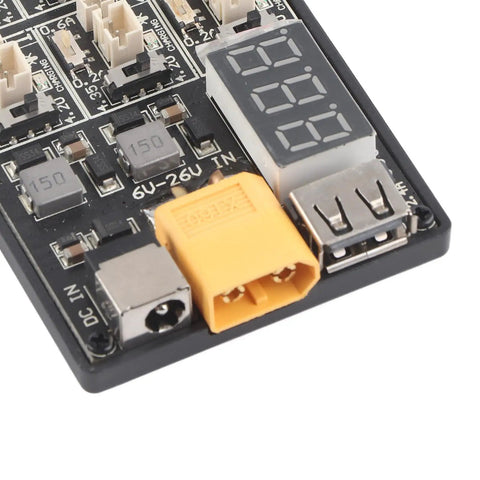 Close-up of the Do It All RC Charger And USB Charging Station For LiPo Batteries And Phones 6 In 1 Multi Function Battery Hub with ports