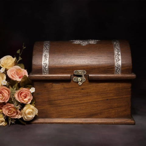 Two Piece Bronze Zinc Alloy Swing Arm Hasp Latch Set With Heavy Duty Mounting Screws For Jewelry Boxes Cabinets And Toolboxes on a wooden chest with floral decor.
