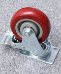 2pcs Dual Bearing Swivel Caster Wheels Red with Brake for Furniture, close-up of the red wheel and metal frame.