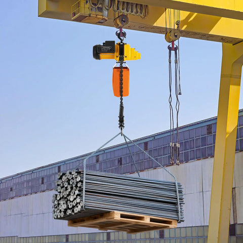 Powerful Heavy Duty Electric Chain Hoist 2200 Lbs Lift With 10 Ft Range And 1300W Motor lifting steel rods from a pallet.