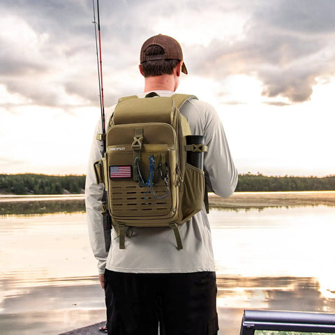 Person wearing Fishing Tackle Backpack With Rod And Gear Holder For All Day Outdoor Use Lightweight Water Resistant Shoulder Bag